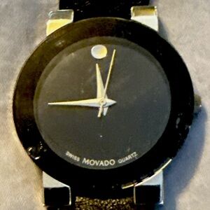 Movado Black Quartz Watch does work in great condition